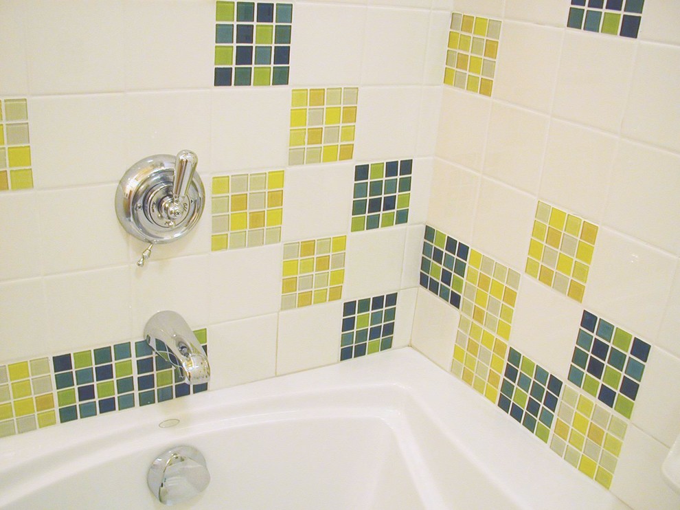 Design ideas for a small midcentury master bathroom in San Francisco with shaker cabinets, light wood cabinets, an alcove tub, a shower/bathtub combo, a two-piece toilet, yellow tile, glass tile, yellow walls and linoleum floors.