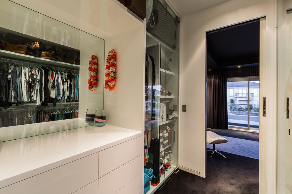 Photo of a contemporary storage and wardrobe in Melbourne.