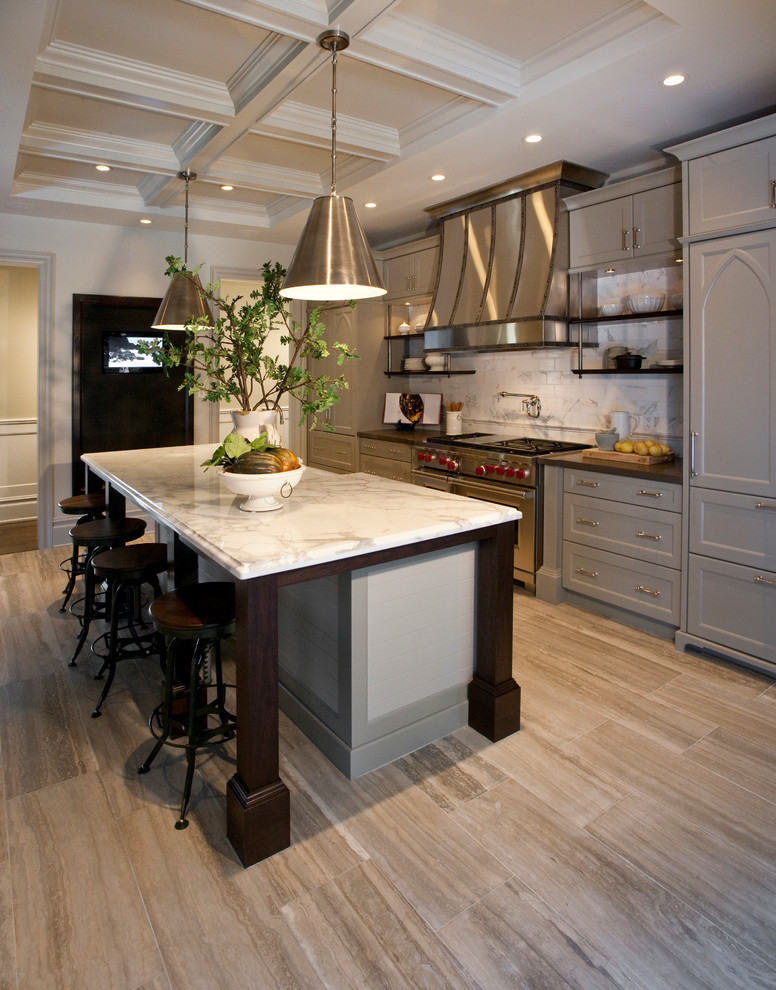 Inspiration for a light wood floor kitchen remodel in Calgary with gray cabinets, stainless steel appliances and an island