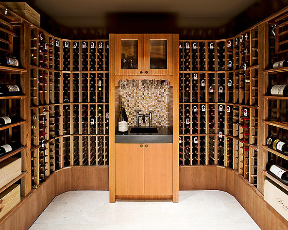 This is an example of an eclectic wine cellar in Atlanta.