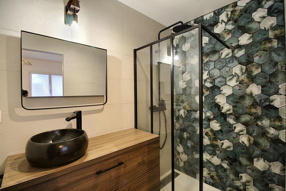 Photo of a small modern 3/4 bathroom in Paris with beaded inset cabinets, medium wood cabinets, a curbless shower, multi-coloured tile, ceramic tile, beige walls, ceramic floors, a drop-in sink, laminate benchtops, grey floor, brown benchtops, a single vanity and a floating vanity.