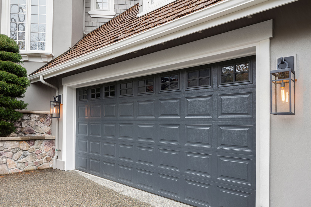 Design ideas for a mid-sized traditional attached two-car carport in Seattle.