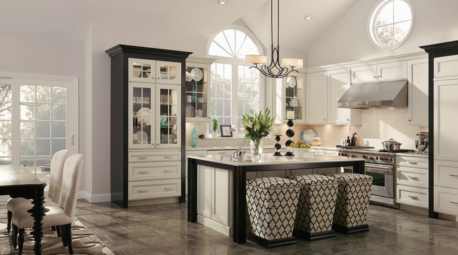 Large transitional l-shaped ceramic tile eat-in kitchen photo in Denver with an undermount sink, shaker cabinets, white cabinets, quartz countertops, white backsplash, colored appliances, white walls and an island