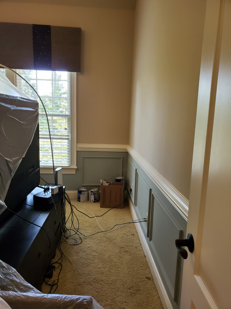 Design ideas for a medium sized master bedroom in Raleigh with multi-coloured walls, carpet, no fireplace, beige floors, a vaulted ceiling and wainscoting.