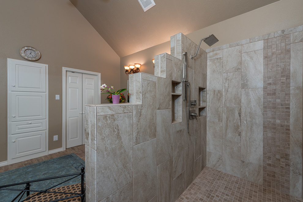 Photo of a mid-sized contemporary master bathroom in Austin with shaker cabinets, brown cabinets, an open shower, beige tile, ceramic tile, beige walls, painted wood floors, an undermount sink, marble benchtops, brown floor, an open shower and multi-coloured benchtops.