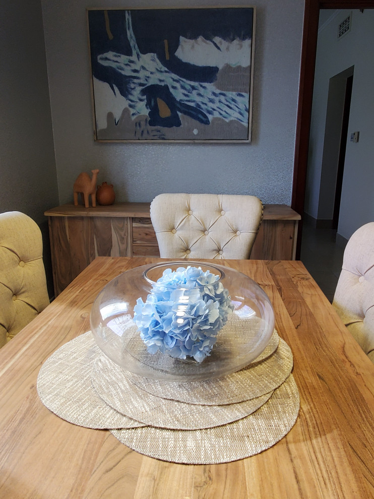 Enclosed dining room - mid-sized shabby-chic style enclosed dining room idea in Other with gray walls