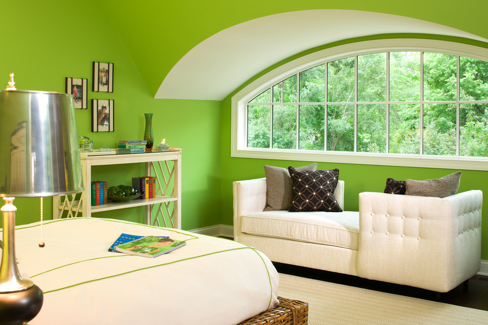 Traditional bedroom in Minneapolis with green walls.