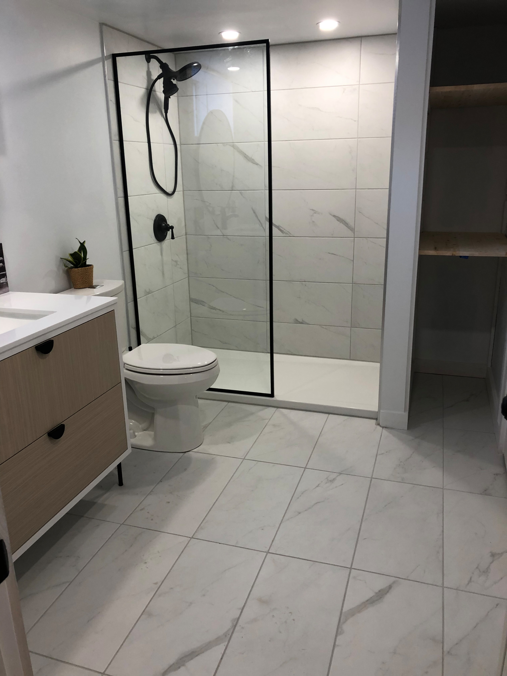 Tile install process including under tile waterproofing
