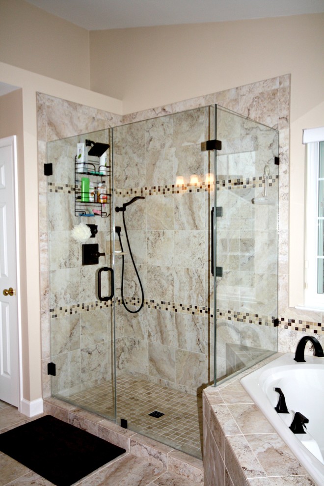 Photo of a large contemporary master bathroom in DC Metro with raised-panel cabinets, medium wood cabinets, a corner tub, a corner shower, a two-piece toilet, beige tile, porcelain tile, beige walls, porcelain floors, an undermount sink and granite benchtops.