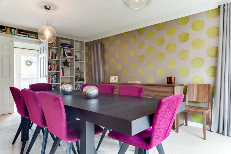 Design ideas for a contemporary dining room in Sussex.