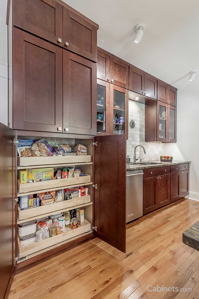 Example of a minimalist kitchen design in Tampa with shaker cabinets and red cabinets