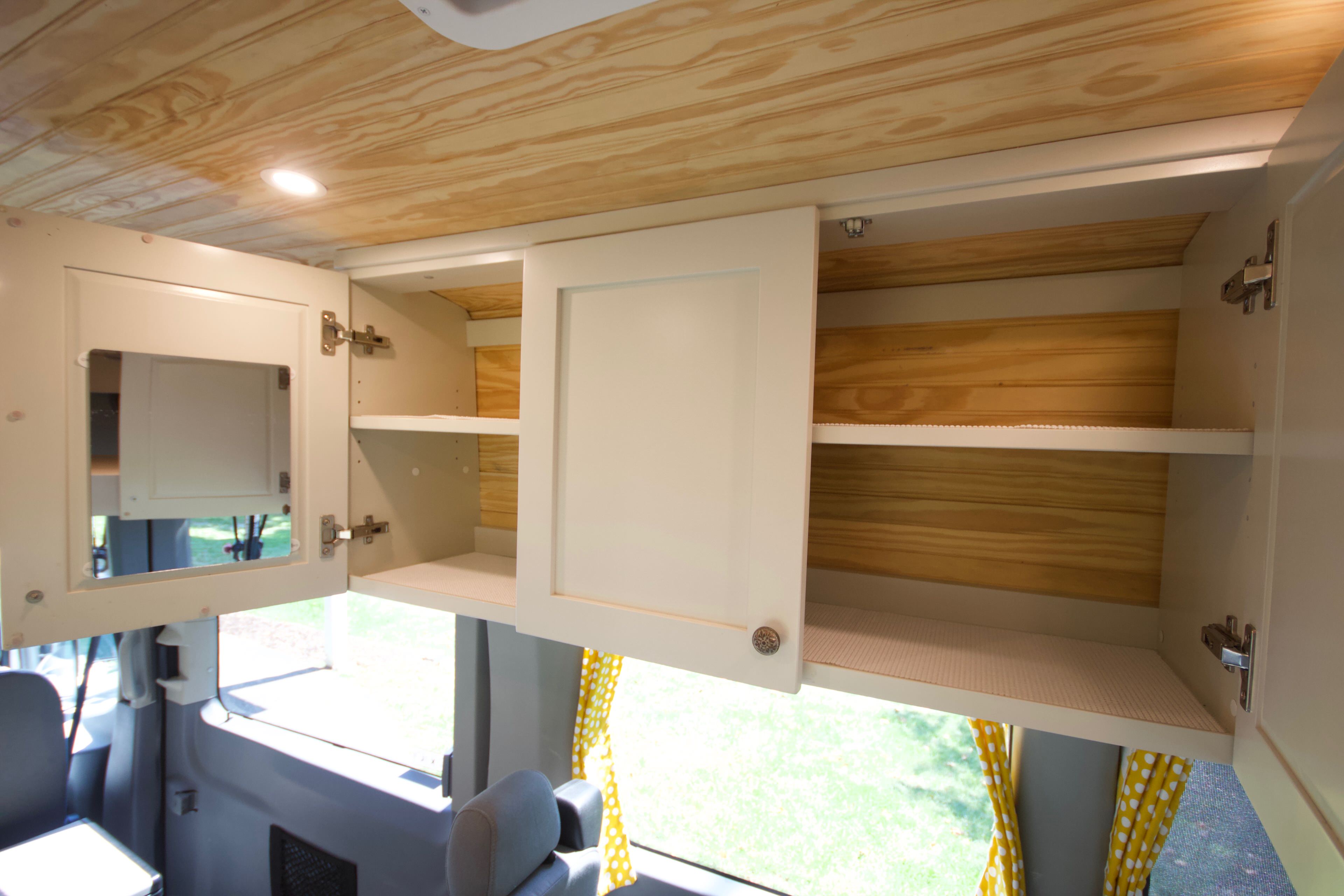 Upper custom cabinets with adjustable shelving