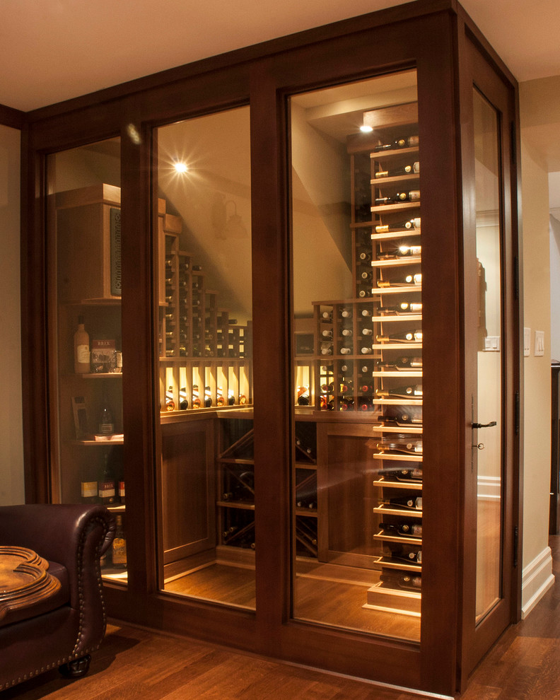 This is an example of a transitional wine cellar in Toronto.