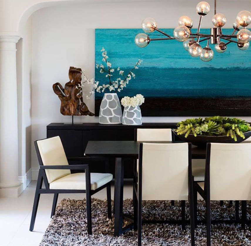 This is an example of a large contemporary open plan dining in San Diego with white walls, marble floors and white floor.