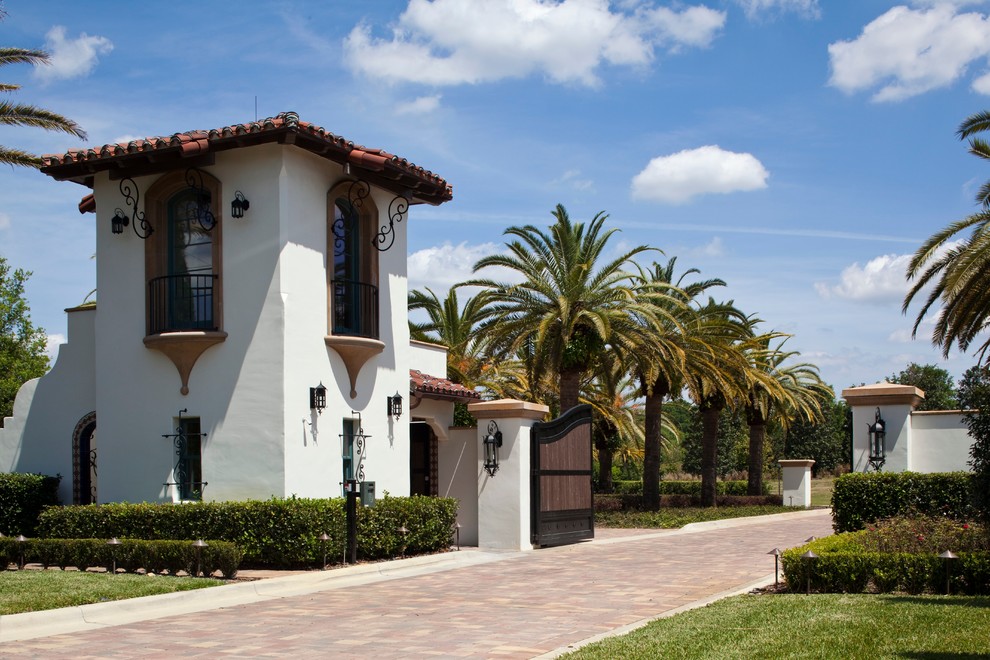 Photo of a mediterranean stucco exterior in Tampa.