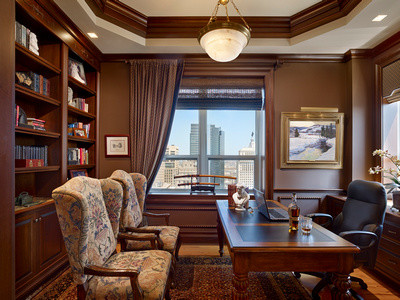 Photo of a mid-sized traditional study room in Philadelphia with brown walls, light hardwood floors and a freestanding desk.
