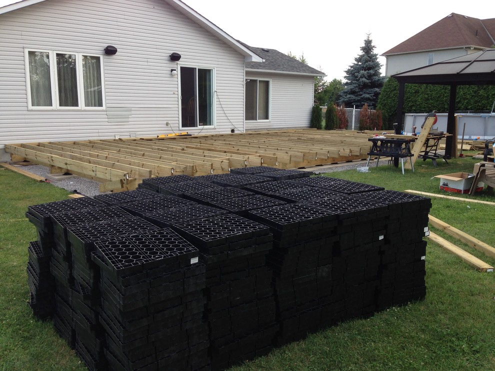 Huge transitional backyard deck photo