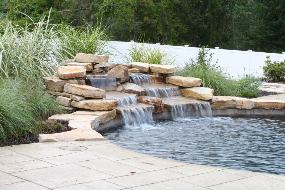 Inspiration for a rustic pool remodel in Boston