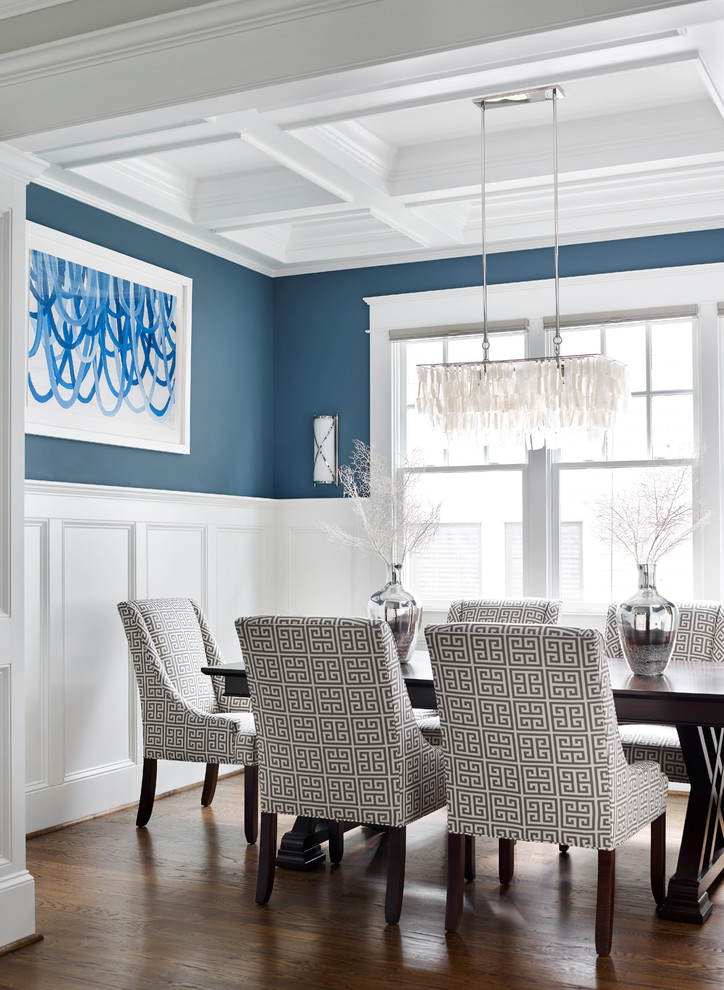 Design ideas for a large modern separate dining room in Atlanta with blue walls, medium hardwood floors and no fireplace.