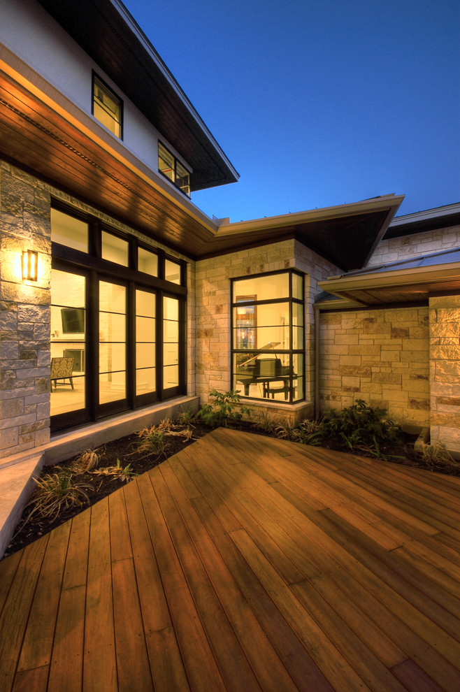 Inspiration for a contemporary exterior in Austin with stone veneer.