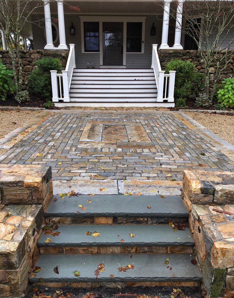 Example of a transitional home design design in Boston