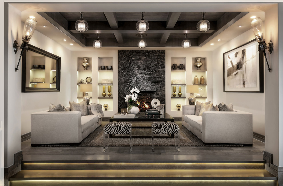Design ideas for an expansive transitional walk-out basement in Orange County with white walls, porcelain floors, a standard fireplace, a stone fireplace surround and brown floor.
