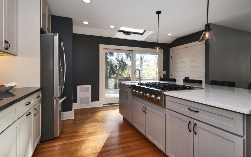 Example of a transitional kitchen design in New York