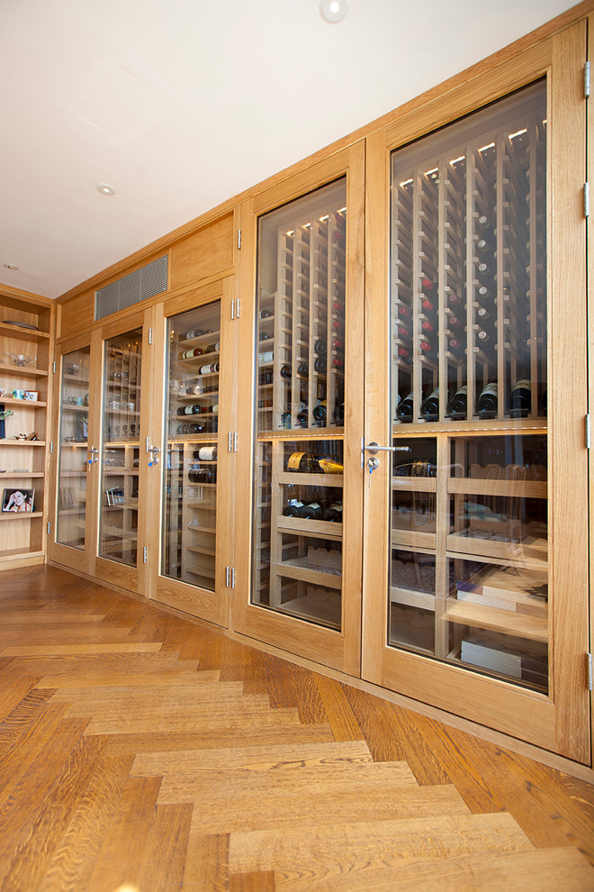 This is an example of a wine cellar in London with display racks.