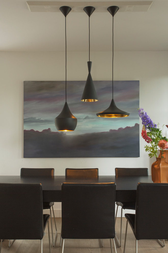 Design ideas for a contemporary dining room in Amsterdam.