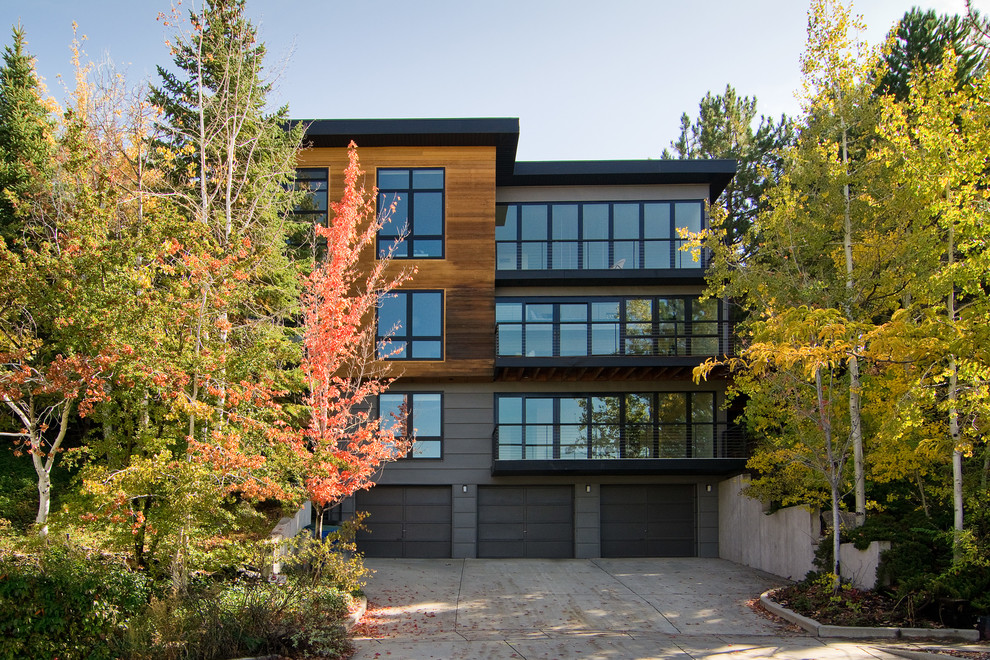 Design ideas for a modern apartment exterior in Salt Lake City with wood siding.