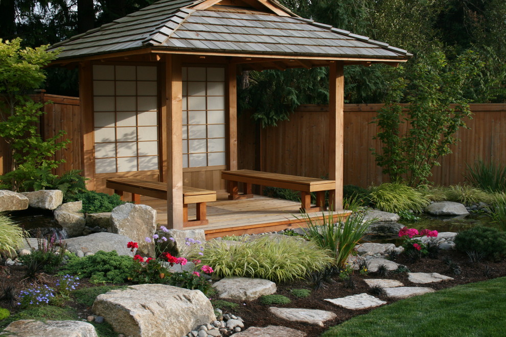 Inspiration for an asian garden in Seattle with decking.