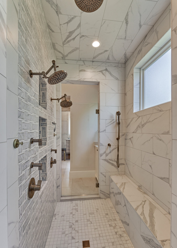 Inspiration for a transitional white tile and marble tile porcelain tile and white floor double shower remodel in Houston with a hinged shower door