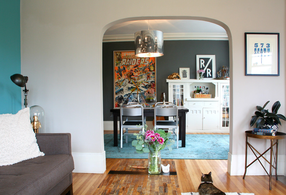 Eclectic dining room in San Francisco with grey walls.
