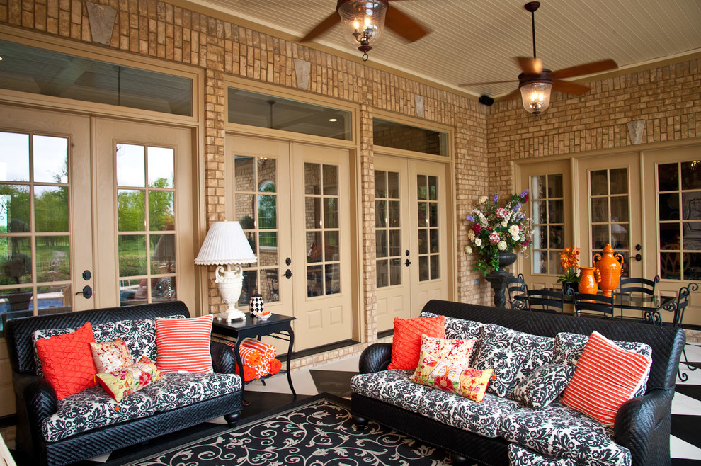Photo of a traditional patio in Nashville with a roof extension.