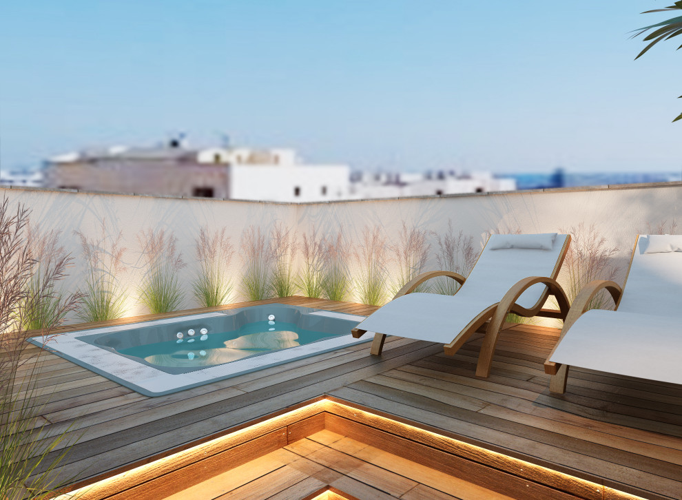 Diseño de terraza minimalista grande en azotea con cocina exterior, pérgola y barandilla de vidrio