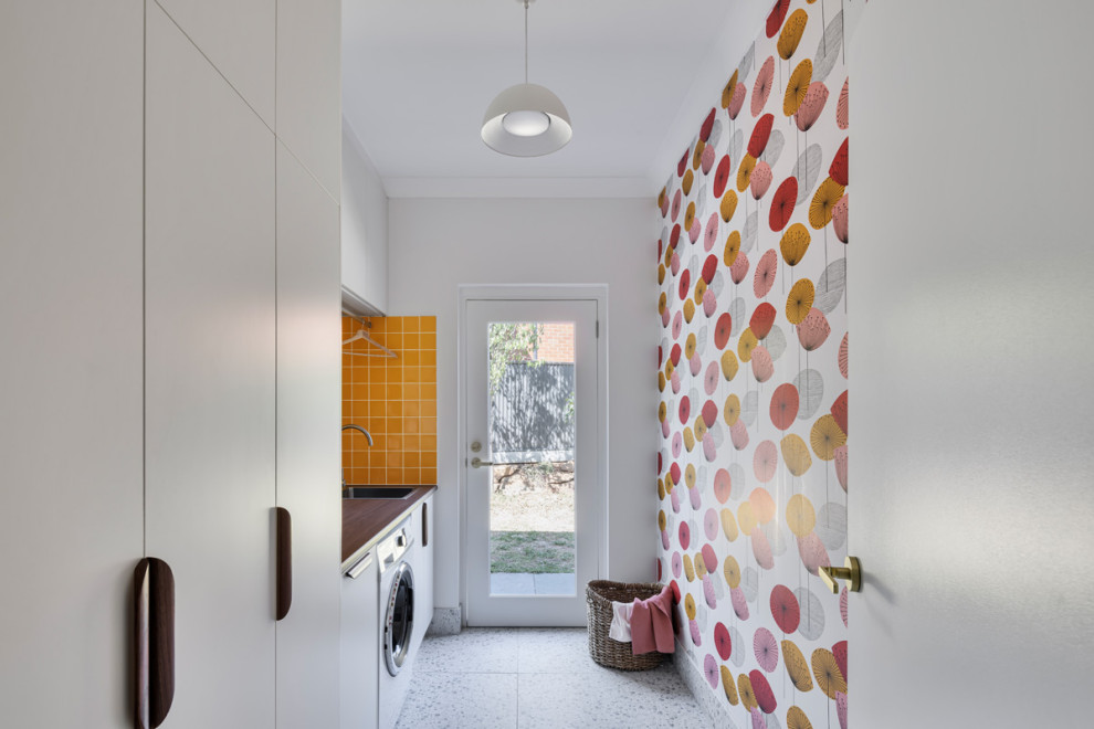 Inspiration for a midcentury laundry room in Other.