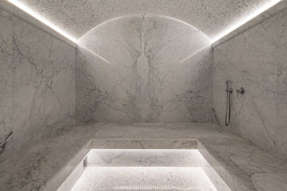 Photo of a large contemporary bathroom in Moscow with grey tiles, grey walls, mosaic tile flooring, grey floors, a single sink, a vaulted ceiling and marble tiles.