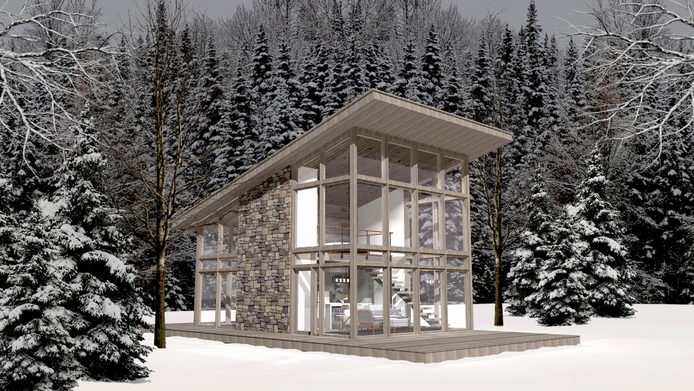 Стильный дизайн: коричневый мини дом среднего размера в стиле модернизм с разными уровнями, облицовкой из камня, односкатной крышей, металлической крышей и серой крышей - последний тренд