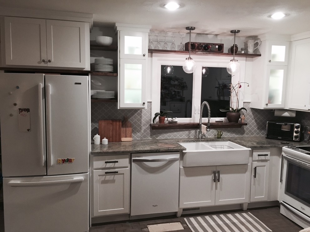This is an example of a small transitional kitchen in Raleigh.