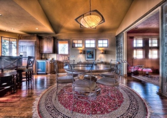 Large mountain style home design photo in Seattle