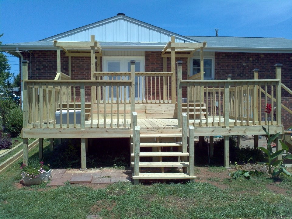 Example of a transitional home design design in Charlotte