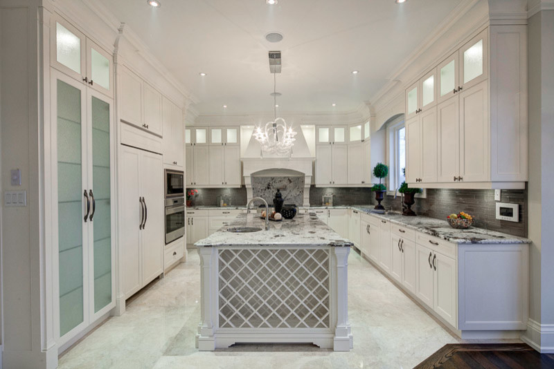 Example of a transitional kitchen design in Toronto