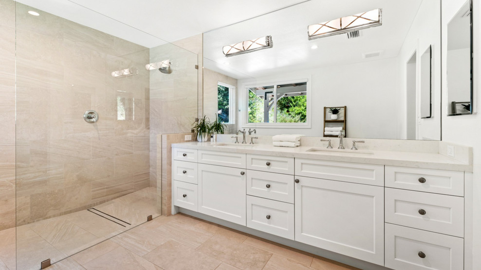 Inspiration for a huge transitional master white tile and porcelain tile porcelain tile and beige floor bathroom remodel in Los Angeles with a wall-mount toilet, white walls, an undermount sink, quartzite countertops and beige countertops