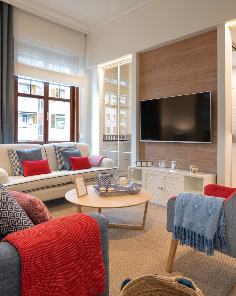 Photo of a large contemporary open concept living room in Bilbao with white walls, a wall-mounted tv and no fireplace.