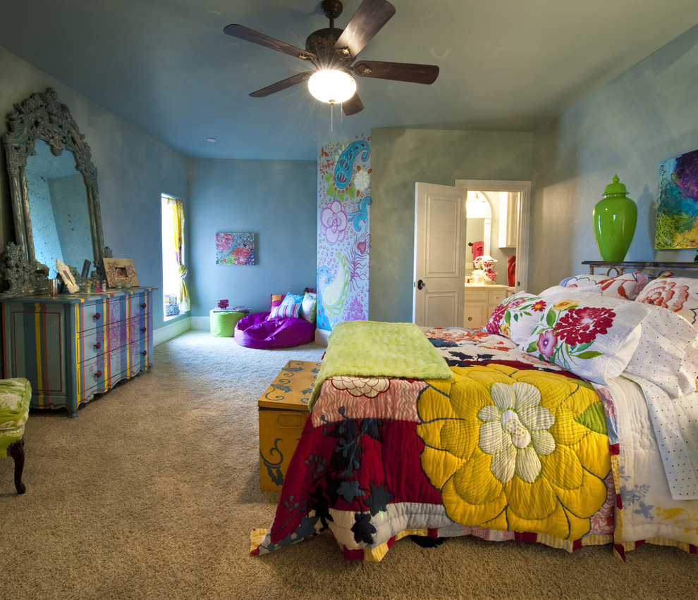 Design ideas for an eclectic bedroom in Oklahoma City with blue walls and carpet.