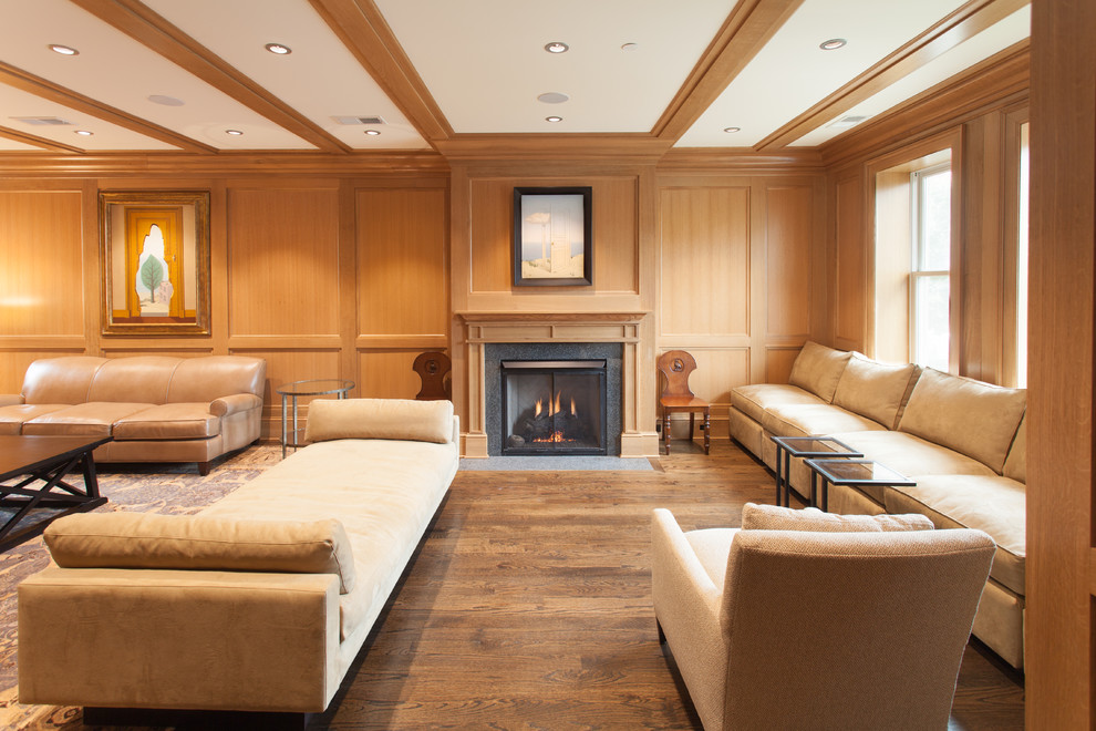 Design ideas for a traditional living room in DC Metro with medium hardwood floors, a standard fireplace and no tv.