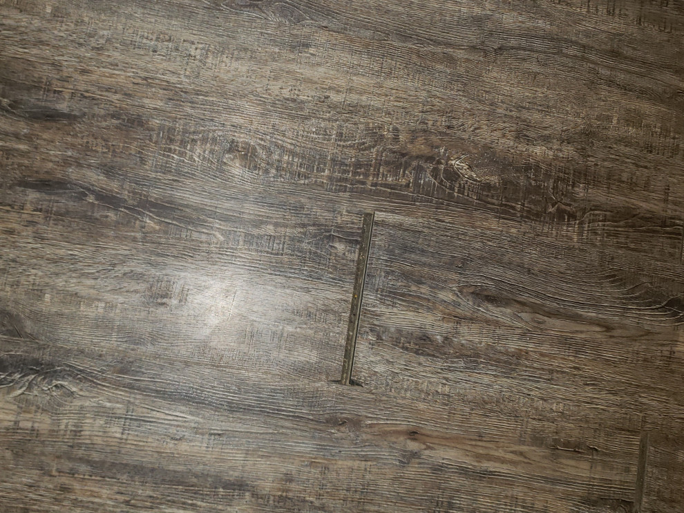 Fix gaps in vinyl flooring?