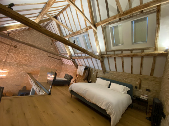Meticulous Barn Conversion rustic-bedroom