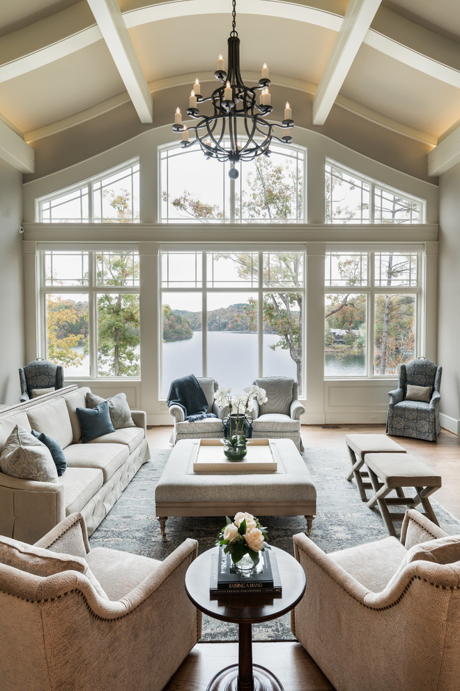 Large elegant formal and enclosed light wood floor and brown floor living room photo in Other with gray walls, no fireplace and no tv