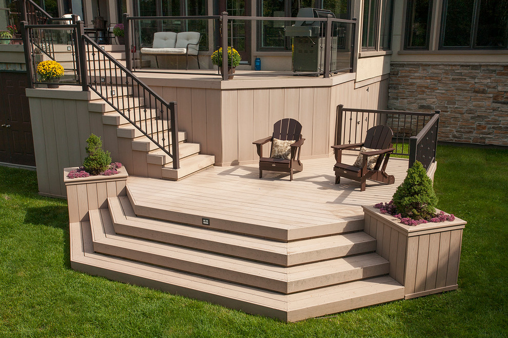 Example of a large trendy backyard deck design in Ottawa